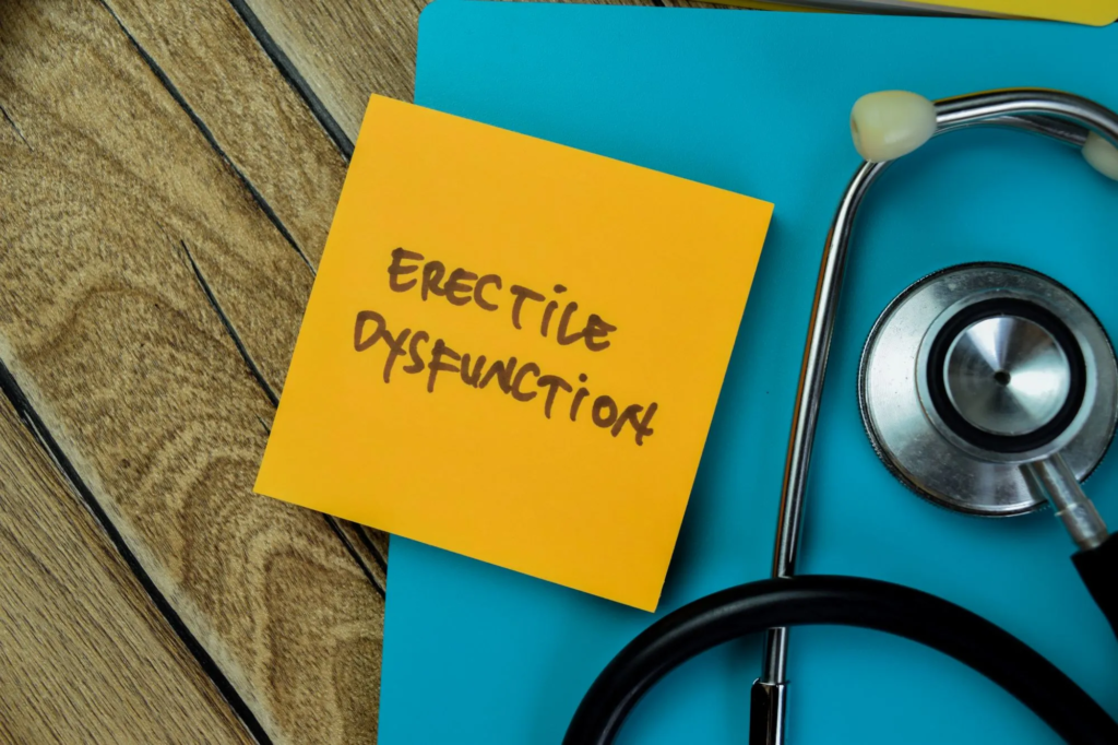 Current image: Man over 40 discussing erectile dysfunction symptoms with a men’s health doctor in Miami
